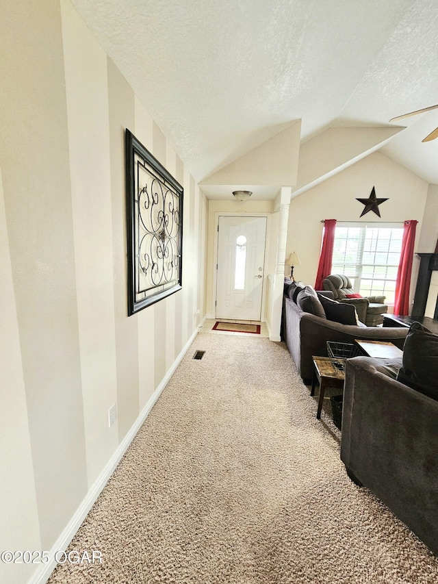 2813 Heartland Ave, Joplin, MO 64804 - living room with carpet flooring, lofted ceiling, and a textured ceiling