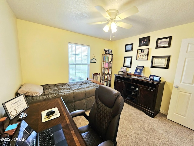 2813 Heartland Ave, Joplin, MO 64804 - bedroom featuring light carpet, ceiling fan, and a textured ceiling