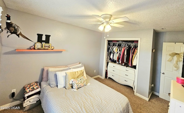 2813 Heartland Ave, Joplin, MO 64804 - carpeted bedroom with a closet, ceiling fan, and a textured ceiling