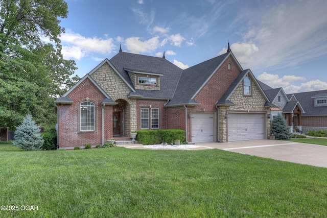 3510 Notting Hill Cir, Joplin, MO 64804 - traditional-style home featuring concrete driveway, a garage, a front yard, and stone siding
