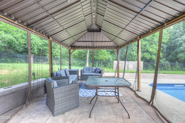 3510 Notting Hill Cir, Joplin, MO 64804 - sunroom / solarium featuring an outdoor living space and lofted ceiling