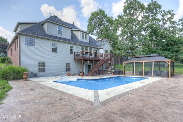3510 Notting Hill Cir, Joplin, MO 64804 - swimming pool with a gazebo, stairs, a wooden deck, a patio, and area for grilling