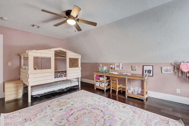 3510 Notting Hill Cir, Joplin, MO 64804 - bedroom with a textured ceiling, wood finished floors, vaulted ceiling, and a ceiling fan