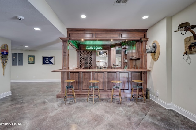 3510 Notting Hill Cir, Joplin, MO 64804 - indoor bar with baseboards and recessed lighting