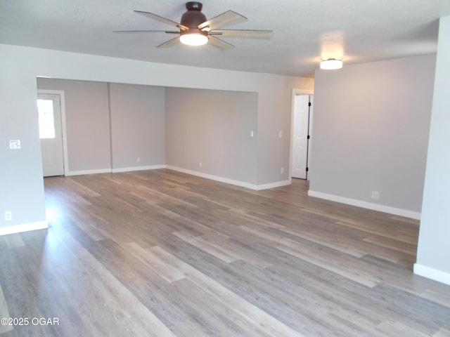 2705 S Michigan Ave, Joplin, MO 64804 - spare room featuring ceiling fan and wood finished floors