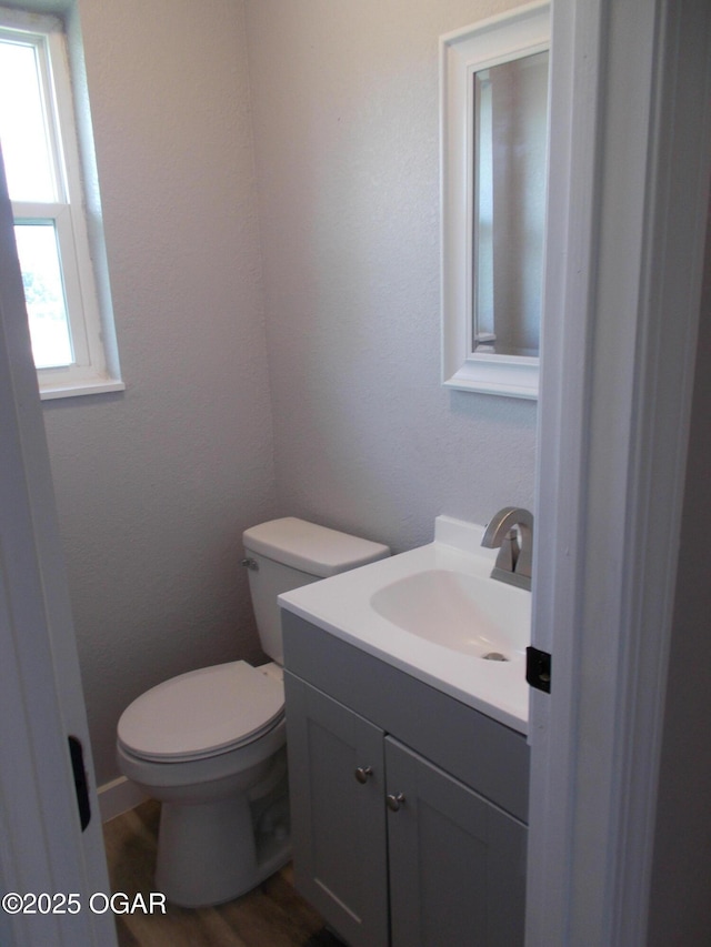2705 S Michigan Ave, Joplin, MO 64804 - half bath featuring vanity and wood finished floors
