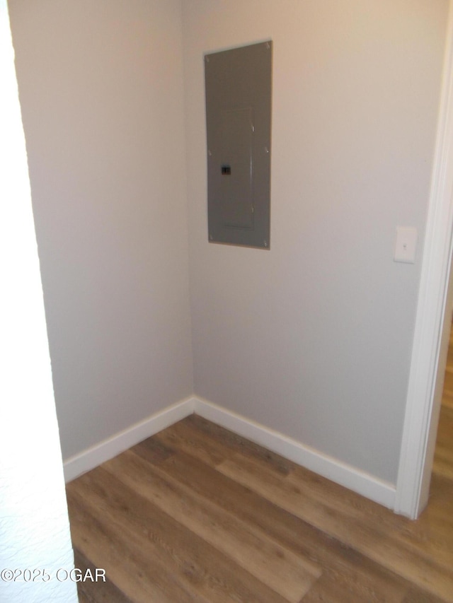 2705 S Michigan Ave, Joplin, MO 64804 - empty room featuring electric panel and wood finished floors
