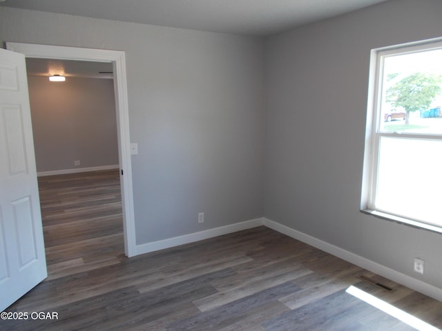 2705 S Michigan Ave, Joplin, MO 64804 - spare room with dark wood-style floors