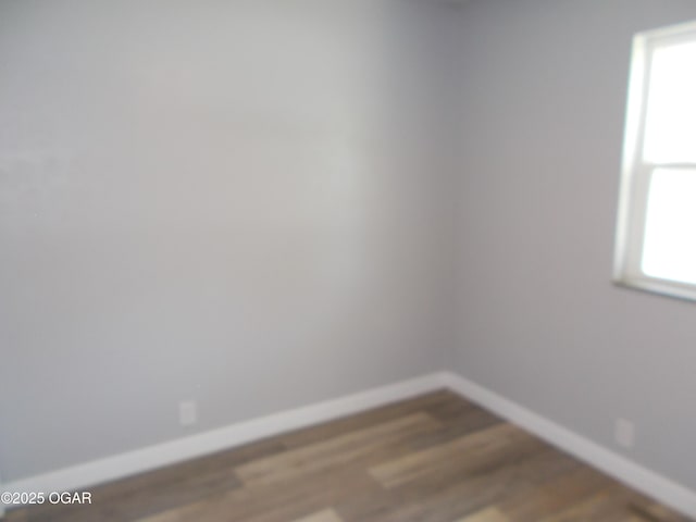 2705 S Michigan Ave, Joplin, MO 64804 - unfurnished room featuring wood finished floors and healthy amount of natural light