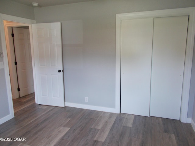 2705 S Michigan Ave, Joplin, MO 64804 - unfurnished bedroom featuring wood finished floors and a closet