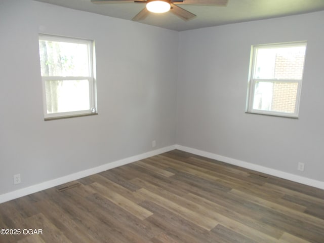 2705 S Michigan Ave, Joplin, MO 64804 - empty room with a ceiling fan and wood finished floors