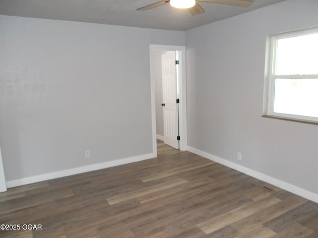 2705 S Michigan Ave, Joplin, MO 64804 - empty room featuring ceiling fan and wood finished floors