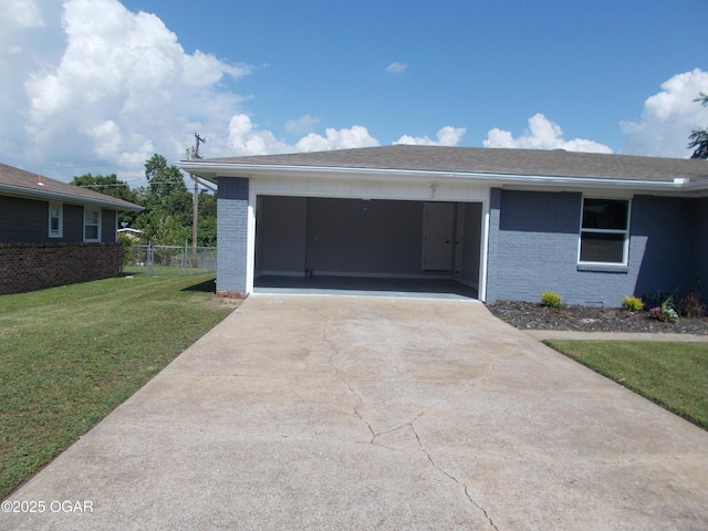 2705 S Michigan Ave, Joplin, MO 64804 - ranch-style house featuring brick siding, concrete driveway, and an attached garage