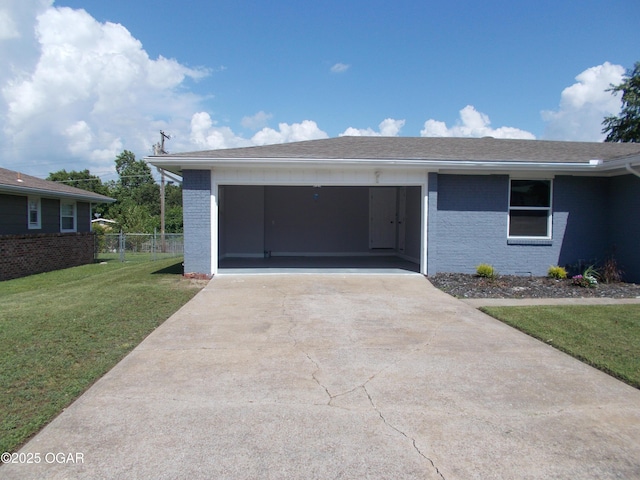 2705 S Michigan Ave, Joplin, MO 64804 - single story home featuring concrete driveway, brick siding, and an attached garage