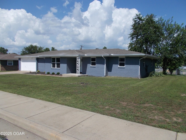 2705 S Michigan Ave, Joplin, MO 64804 - ranch-style home featuring a garage, a front lawn, driveway, and brick siding