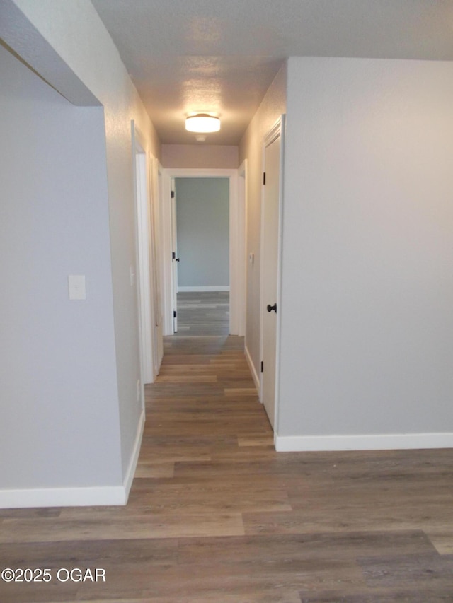 2705 S Michigan Ave, Joplin, MO 64804 - hall featuring wood finished floors and baseboards