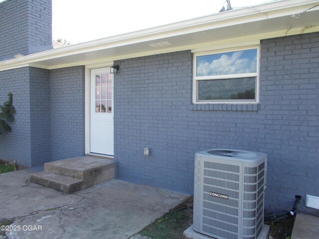 2705 S Michigan Ave, Joplin, MO 64804 - entrance to property featuring brick siding and a chimney