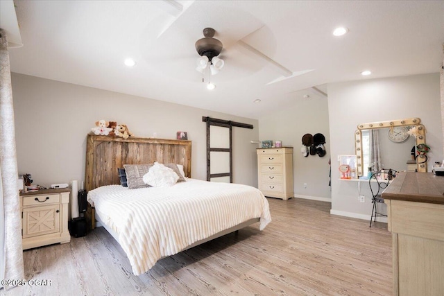 11284 Norway Rd, Neosho, MO 64850 - bedroom with light wood-type flooring, a barn door, recessed lighting, lofted ceiling, and a ceiling fan