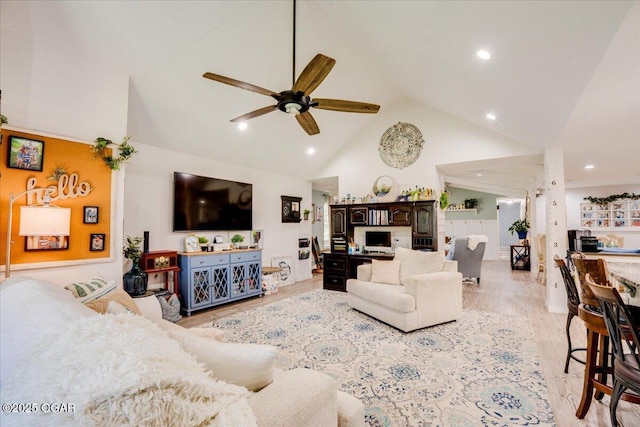 11284 Norway Rd, Neosho, MO 64850 - living room with a ceiling fan, high vaulted ceiling, light wood-style flooring, and recessed lighting
