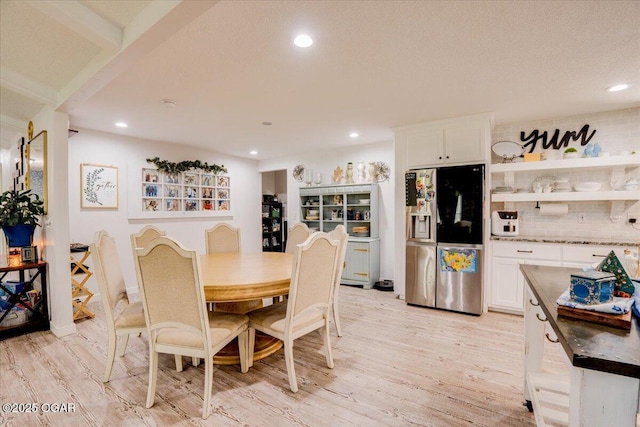 11284 Norway Rd, Neosho, MO 64850 - dining space featuring light wood-style floors and recessed lighting