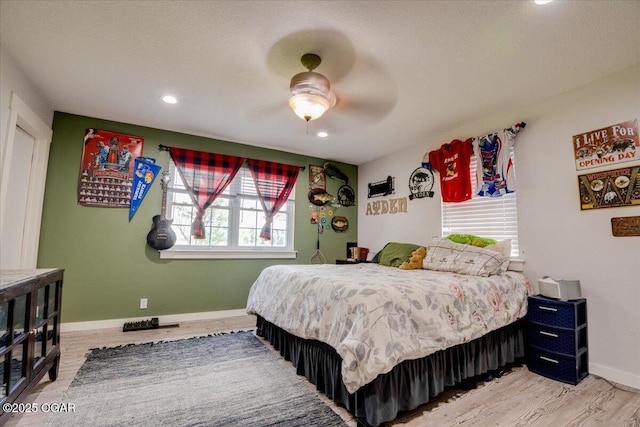 11284 Norway Rd, Neosho, MO 64850 - bedroom featuring recessed lighting, light wood-style flooring, and a ceiling fan