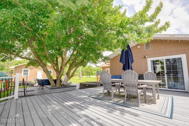 11284 Norway Rd, Neosho, MO 64850 - wooden deck with outdoor dining area