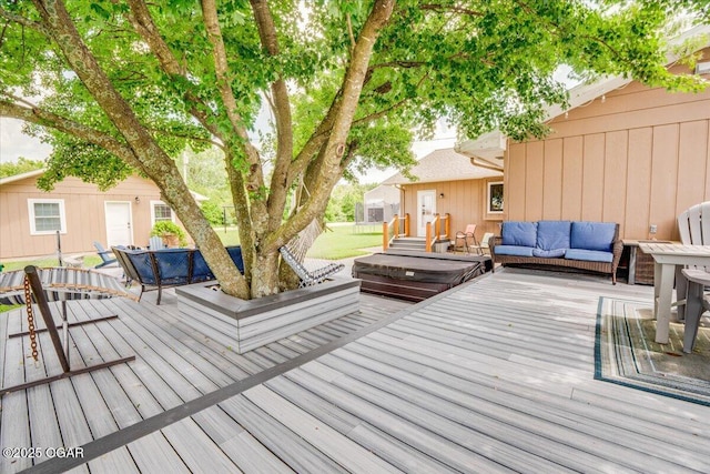11284 Norway Rd, Neosho, MO 64850 - wooden deck with an outdoor living space