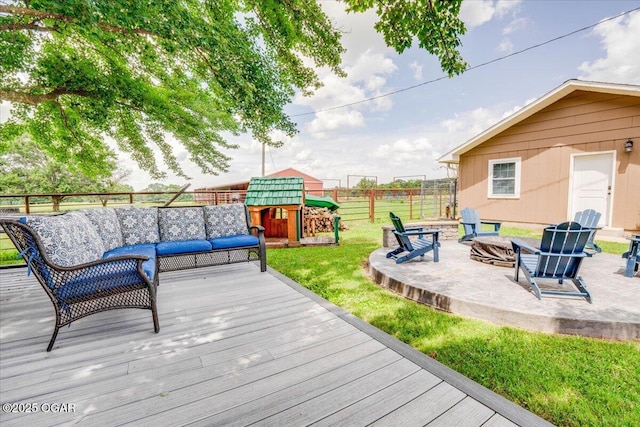 11284 Norway Rd, Neosho, MO 64850 - wooden terrace featuring an outdoor living space with a fire pit, a fenced backyard, and a patio area
