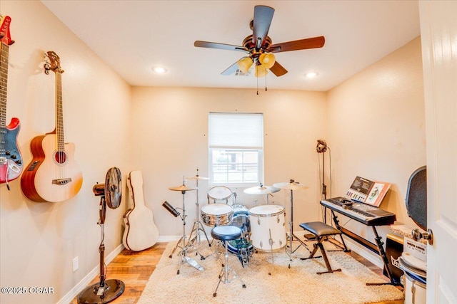 11284 Norway Rd, Neosho, MO 64850 - rec room with wood finished floors, ceiling fan, and recessed lighting