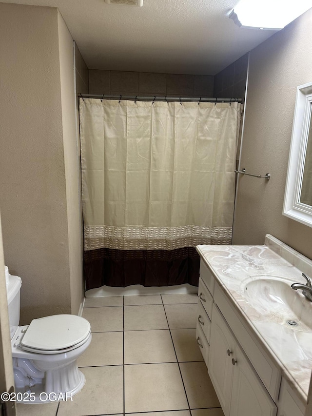 2223 Texas Ave, Joplin, MO 64804 - bathroom with vanity, tile patterned floors, and a shower with curtain
