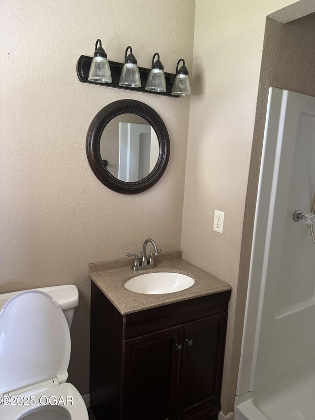 2223 Texas Ave, Joplin, MO 64804 - bathroom with vanity and a shower