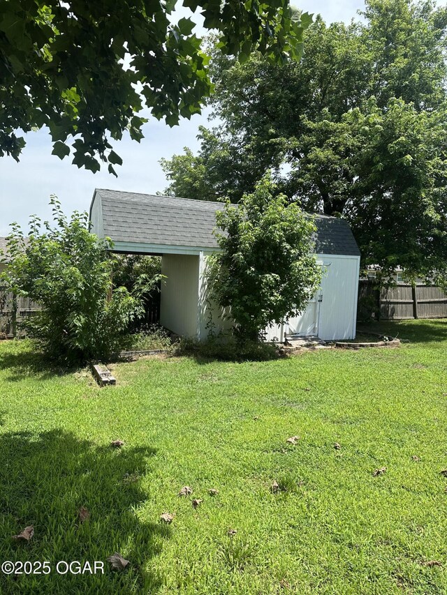 2223 Texas Ave, Joplin, MO 64804 - view of yard featuring a storage shed