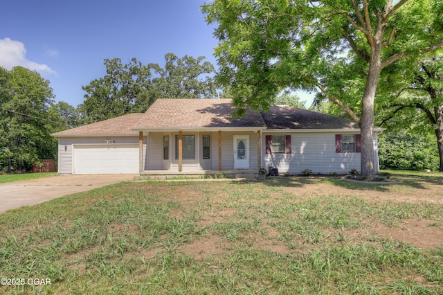 5223 County Lane 301, Joplin, MO 64801 - single story home with a garage, concrete driveway, a porch, and a front lawn