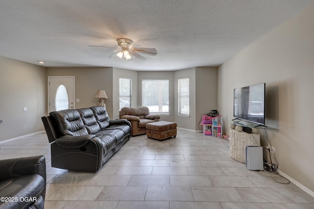 5223 County Lane 301, Joplin, MO 64801 - living area with ceiling fan, healthy amount of natural light, a textured ceiling, and light tile patterned flooring