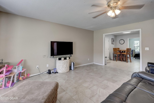 5223 County Lane 301, Joplin, MO 64801 - living room with ceiling fan and light tile patterned floors