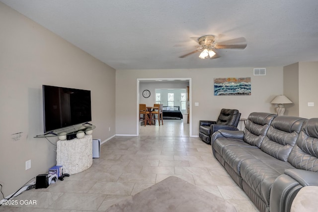 5223 County Lane 301, Joplin, MO 64801 - living room with ceiling fan and light tile patterned floors