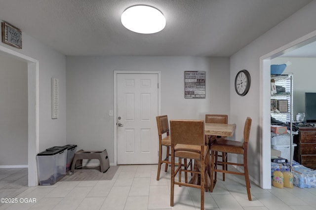 5223 County Lane 301, Joplin, MO 64801 - dining room with a textured ceiling