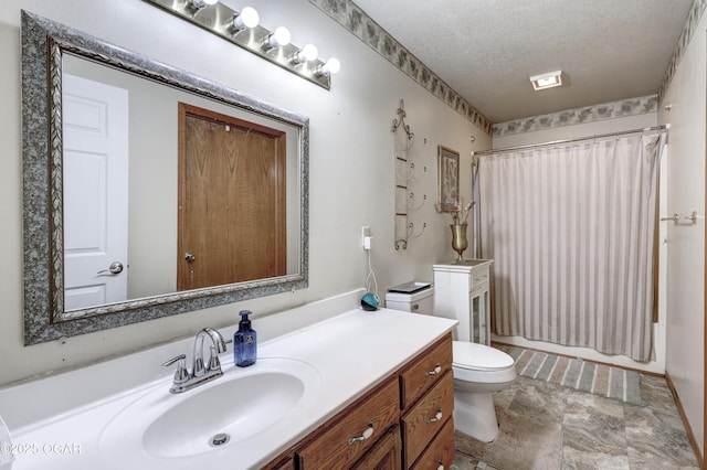 5223 County Lane 301, Joplin, MO 64801 - full bath featuring vanity, a textured ceiling, and stone finish floors