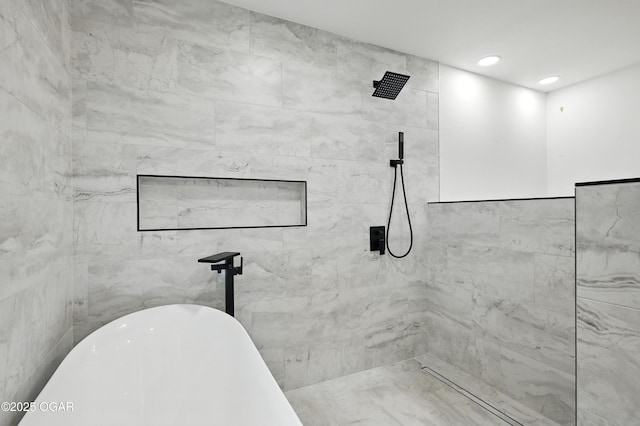 12807 Larissa Ln, Neosho, MO 64850 - full bath featuring a freestanding tub and tiled shower