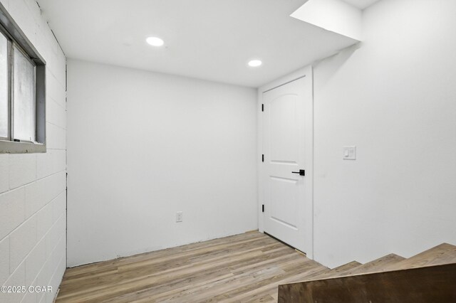 12807 Larissa Ln, Neosho, MO 64850 - unfurnished room featuring light wood-type flooring and recessed lighting