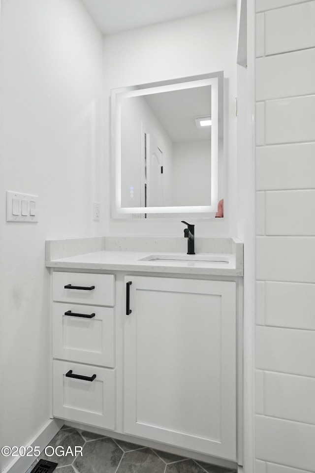 12807 Larissa Ln, Neosho, MO 64850 - bathroom with vanity and baseboards