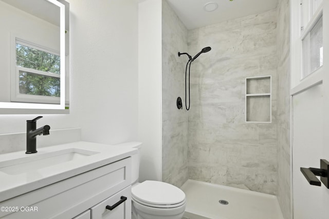 12807 Larissa Ln, Neosho, MO 64850 - bathroom featuring vanity and tiled shower