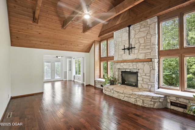 3310 Tana St, Joplin, MO 64804 - unfurnished living room with ceiling fan, high vaulted ceiling, a wood ceiling with exposed beams, plenty of natural light, and a stone fireplace