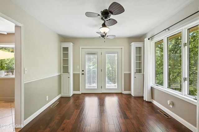 3310 Tana St, Joplin, MO 64804 - doorway to outside featuring plenty of natural light and dark wood-type flooring