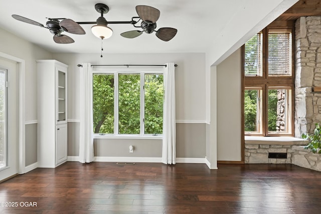 3310 Tana St, Joplin, MO 64804 - unfurnished room featuring ceiling fan and dark wood-style flooring