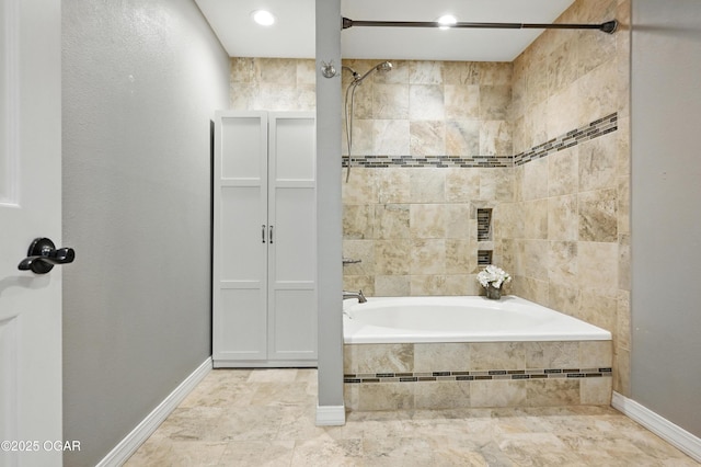 3310 Tana St, Joplin, MO 64804 - full bathroom with tiled shower / bath combo and baseboards
