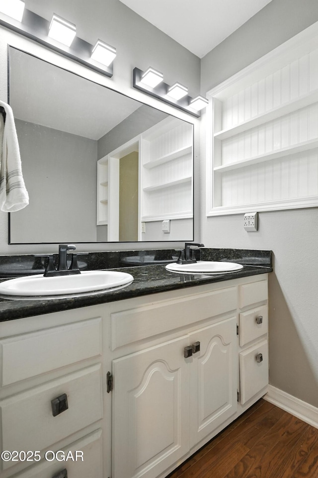 3310 Tana St, Joplin, MO 64804 - bathroom with double vanity and wood finished floors