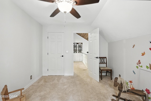 3310 Tana St, Joplin, MO 64804 - living area featuring light colored carpet, ceiling fan, and lofted ceiling