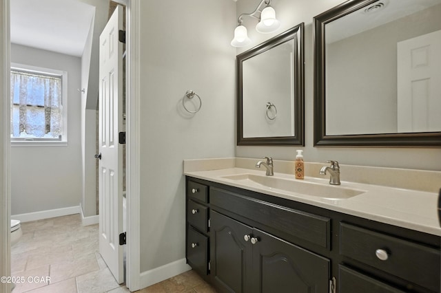 3310 Tana St, Joplin, MO 64804 - bathroom featuring toilet and vanity