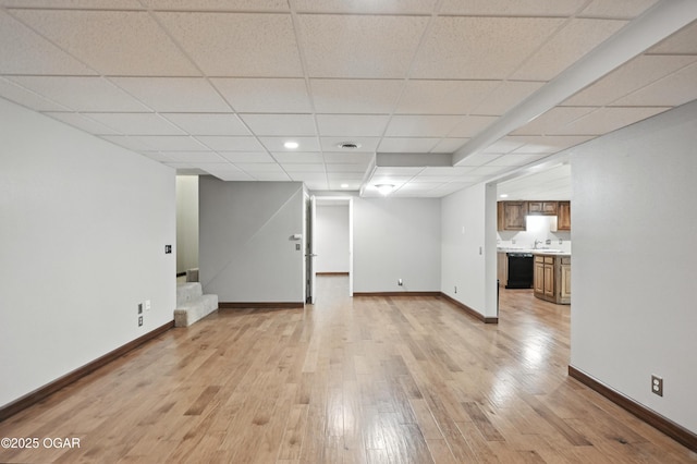 3310 Tana St, Joplin, MO 64804 - unfurnished living room with light wood-type flooring, a paneled ceiling, and stairway